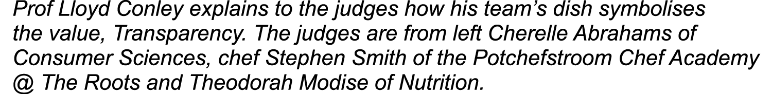 Prof Lloyd Conley explains to the judges how his team s dish symbolises the value, Transparency  The judges are from    