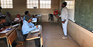 Learners attend a class lesson.