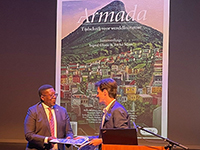 The South African ambassador HE Vusi Madonsela, receives the special issue on Afrikaans by the Dutch journal for world literature, <em>Armada</em>, from Prof Tycho Maas.