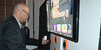 Prof Daryl Balia, deputy vice-chancellor for information technology and Potchefstroom Campus operations, discovers one of the many exciting new applications at the VR simulation laboratory.